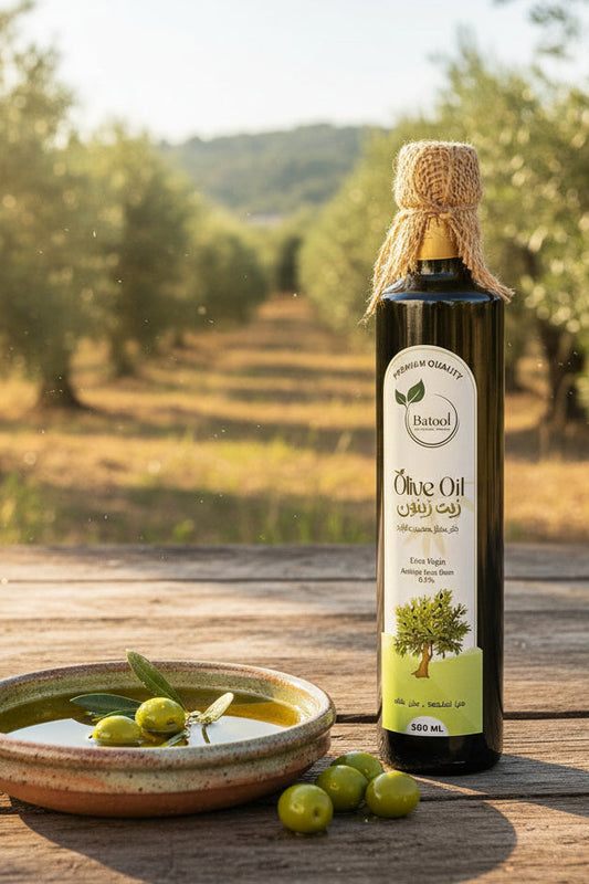 زيت زيتون بكر ممتاز من بتول معصور عالبارد حموضة أقل من 0.8% في عبوة زجاجية أنيقة.