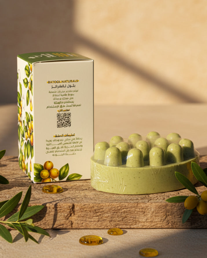Close-up of Royal Sidr Soap massage bar showing its natural texture and green color